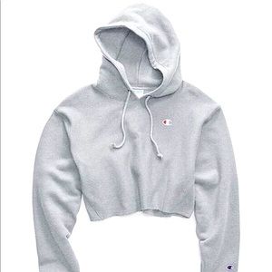 Size Medium. Light grey cropped Champion Hoodie.